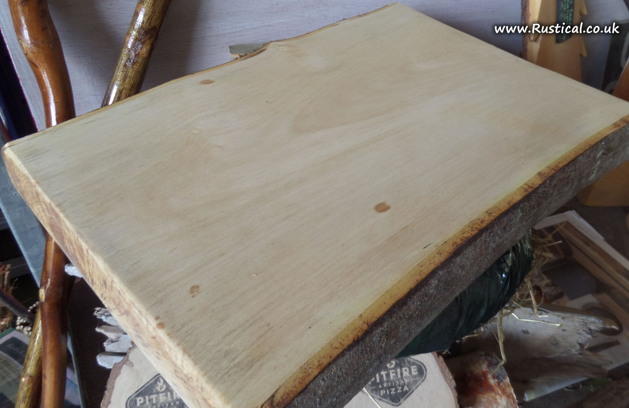 Large sycamore board gets its first oiling after sanding