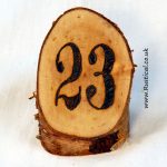Branded rustic log table numbers