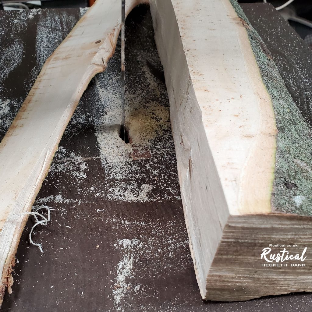 Taking off the excess wood with a bandsaw